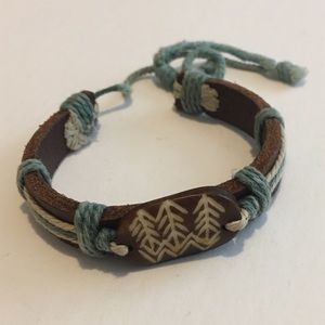 Leather tribal image tied bangle green, white, bwn